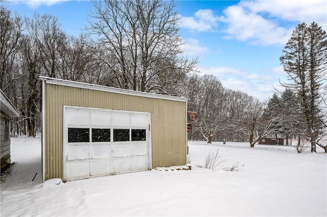 view of snow covered garage