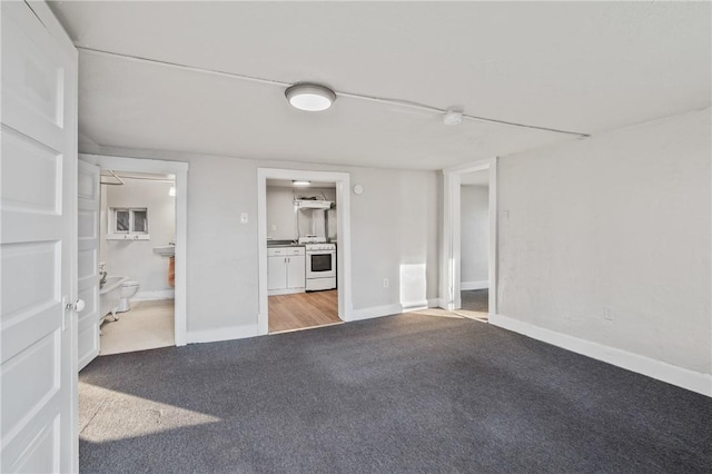 unfurnished living room with carpet floors