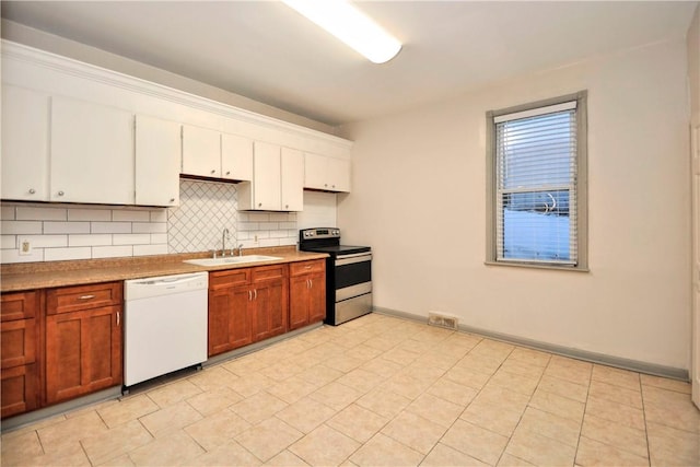 kitchen featuring decorative backsplash, stainless steel range with electric stovetop, white dishwasher, sink, and white cabinetry