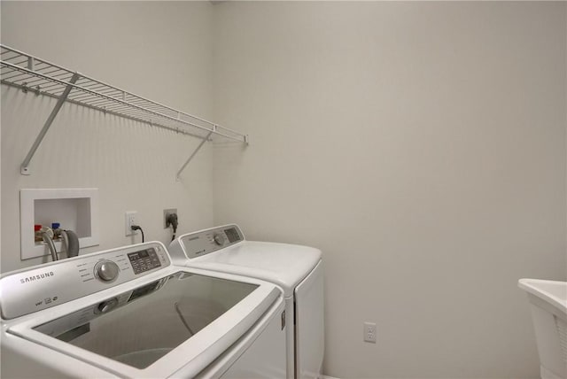 laundry area with washer and clothes dryer