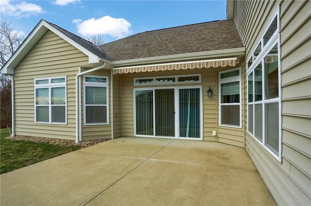 back of property with a patio area