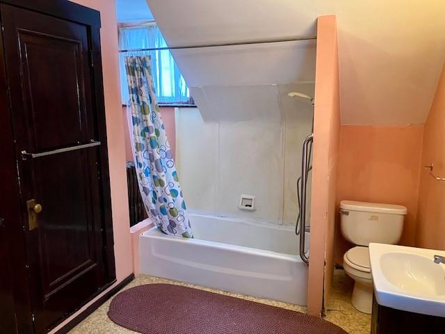 full bathroom with vanity, toilet, and shower / bathtub combination with curtain