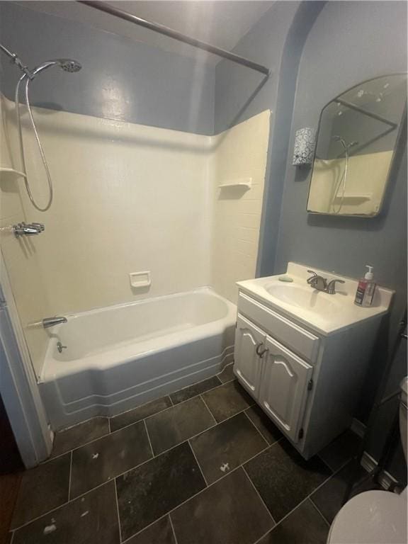 full bathroom with tile patterned flooring, shower / tub combination, vanity, and toilet