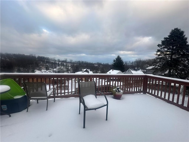 view of snow covered deck