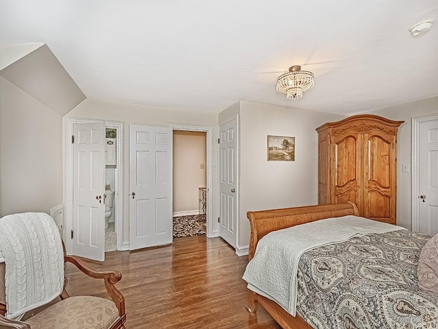 bedroom featuring hardwood / wood-style flooring