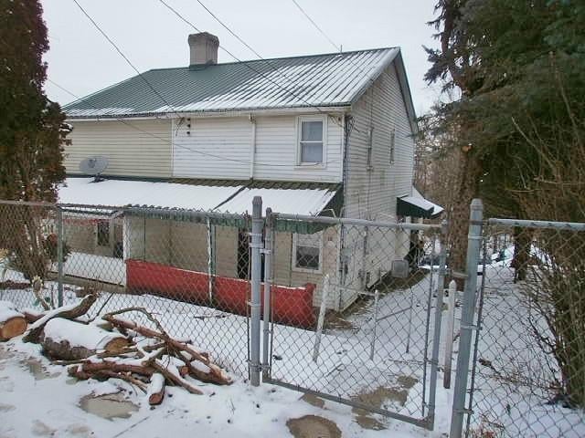 view of snow covered exterior