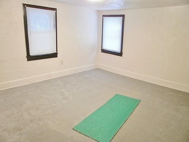 empty room featuring carpet