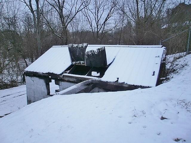 view of entry to storm shelter