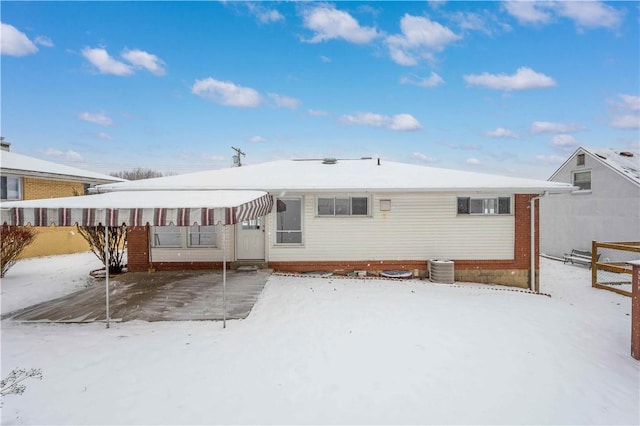 view of snow covered house