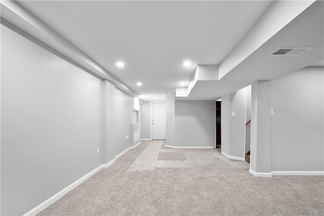 basement with light carpet