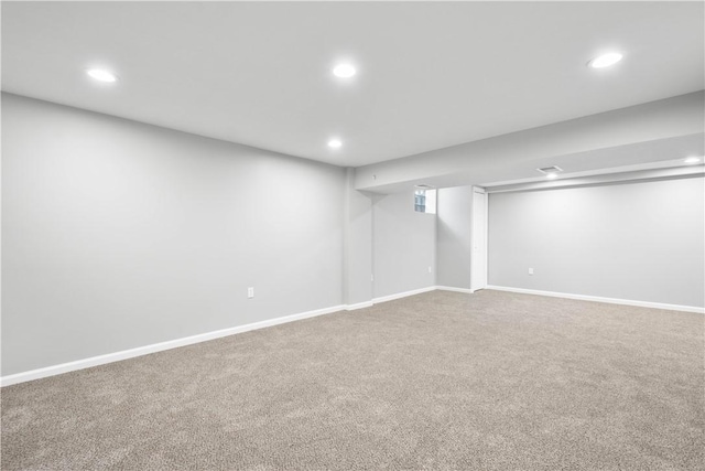 basement featuring carpet floors