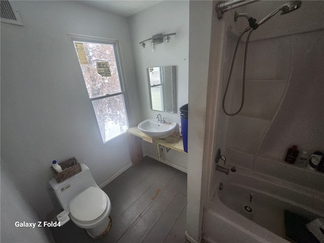 full bathroom with toilet, shower / bathtub combination, and sink