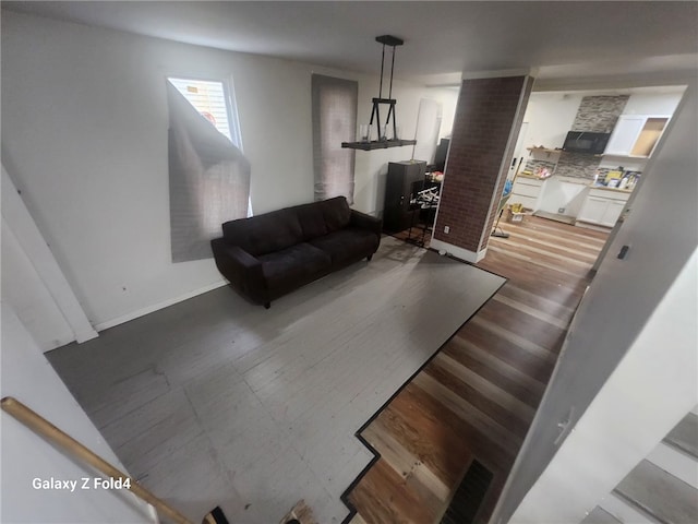 living room featuring wood-type flooring