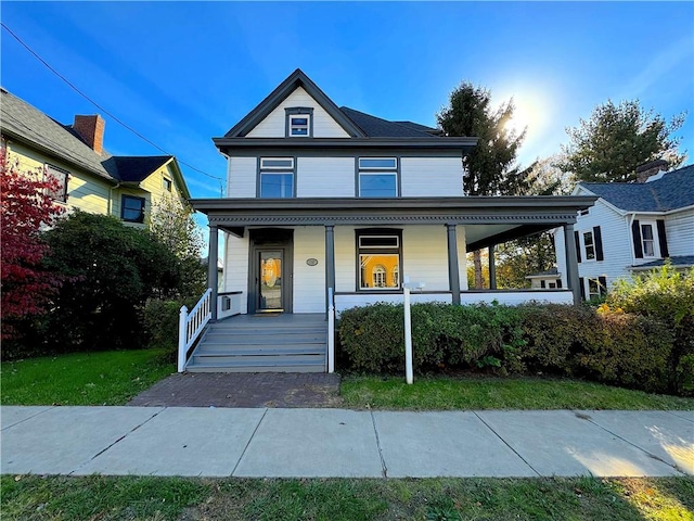 view of front of house featuring covered porch