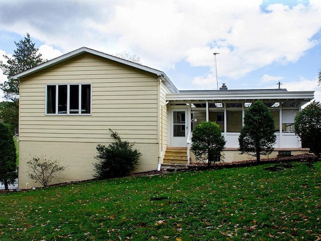 exterior space featuring a lawn