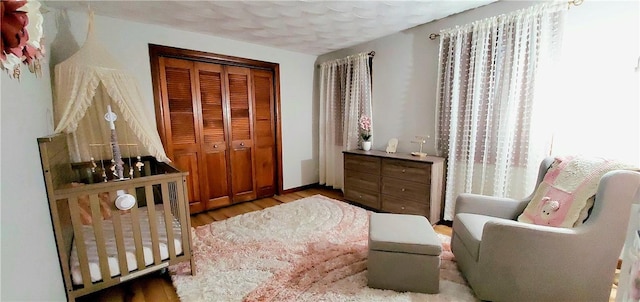 interior space featuring a textured ceiling and hardwood / wood-style flooring