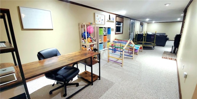 carpeted home office featuring crown molding