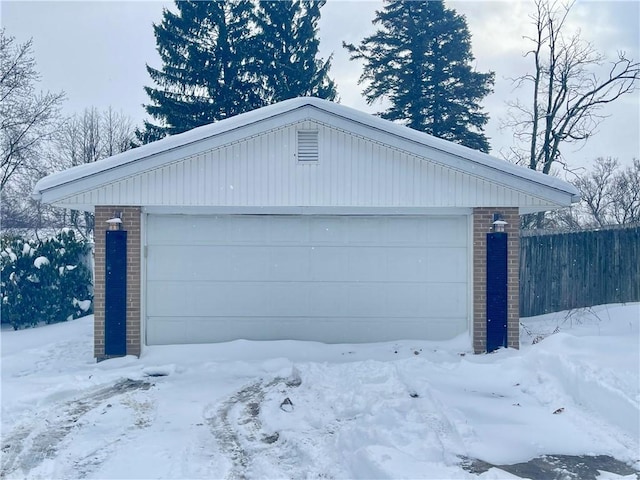 view of snow covered garage