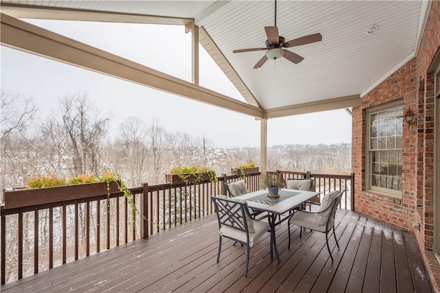 wooden terrace featuring ceiling fan