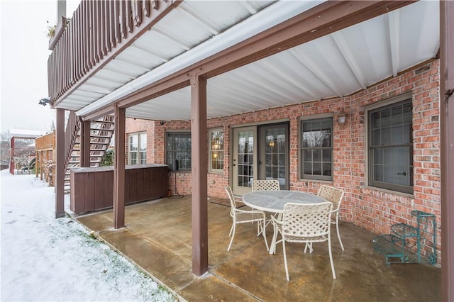 view of snow covered patio