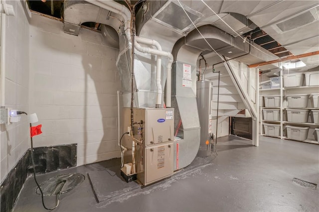 utility room featuring gas water heater and heating unit