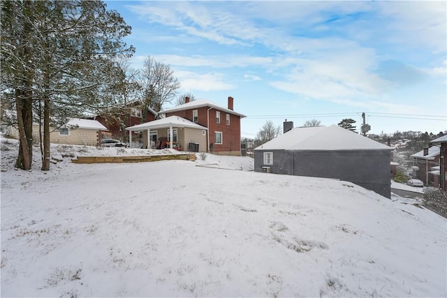 view of yard covered in snow