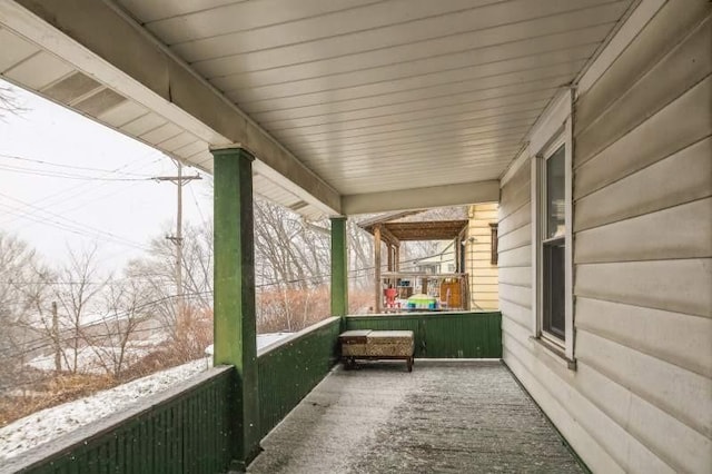 balcony featuring a porch