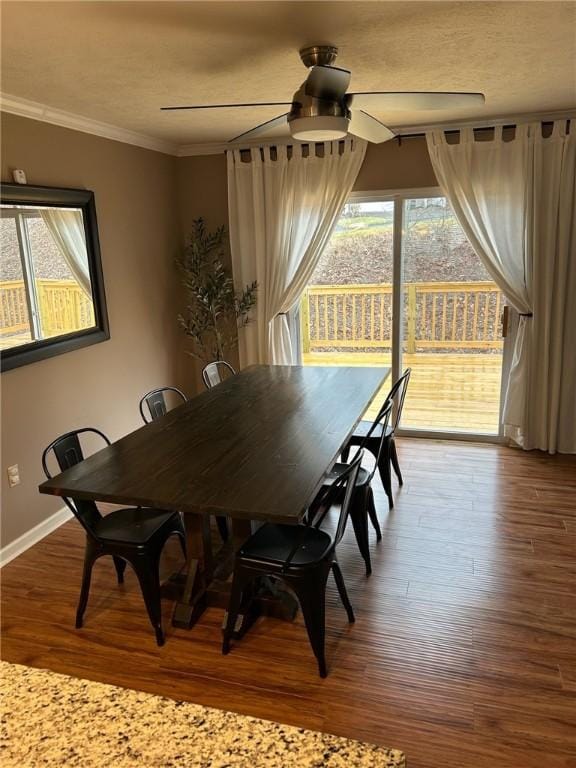 dining space featuring ceiling fan, crown molding, and wood-type flooring