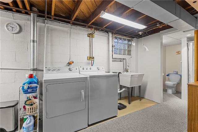 laundry room with washing machine and clothes dryer