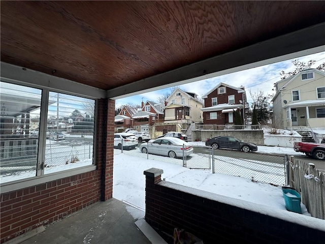 view of snow covered patio