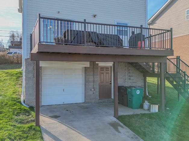 exterior space with a yard and a garage