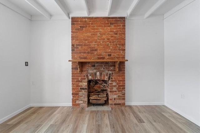 unfurnished living room with light hardwood / wood-style floors