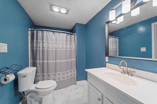 bathroom with vanity, a textured ceiling, toilet, and walk in shower