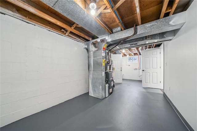 basement featuring heating unit