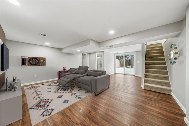 living room featuring dark wood-type flooring