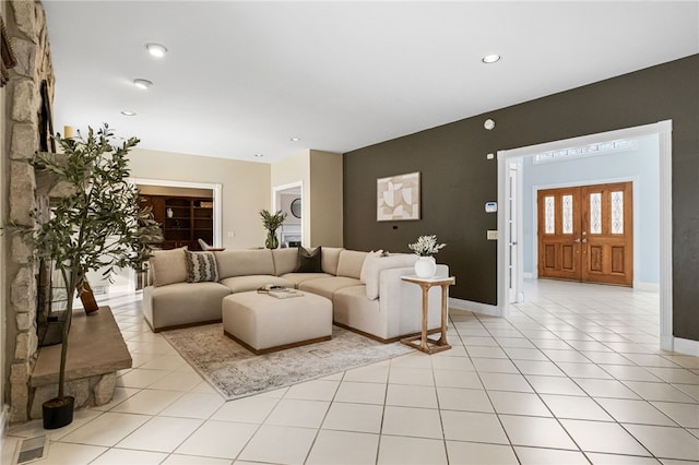 living room with light tile patterned flooring