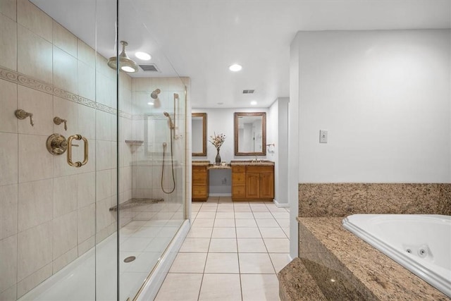 bathroom featuring tile patterned flooring, vanity, and separate shower and tub