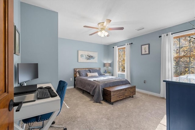 carpeted bedroom featuring ceiling fan