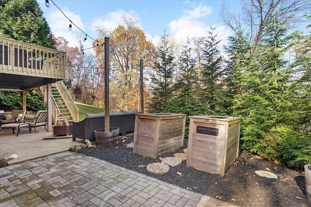 view of patio / terrace featuring an outdoor hangout area and a deck