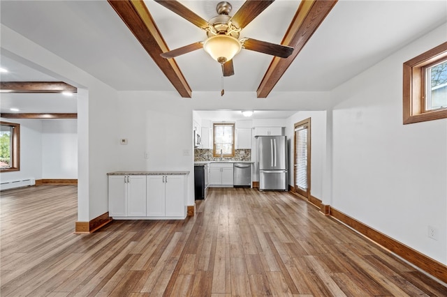 unfurnished living room with beam ceiling, a baseboard radiator, light hardwood / wood-style flooring, and ceiling fan