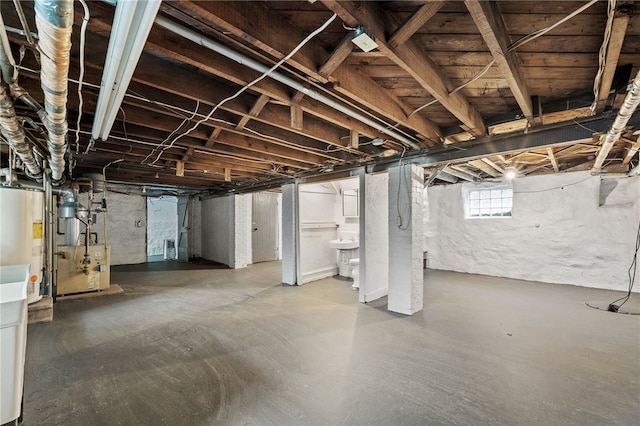 basement featuring gas water heater