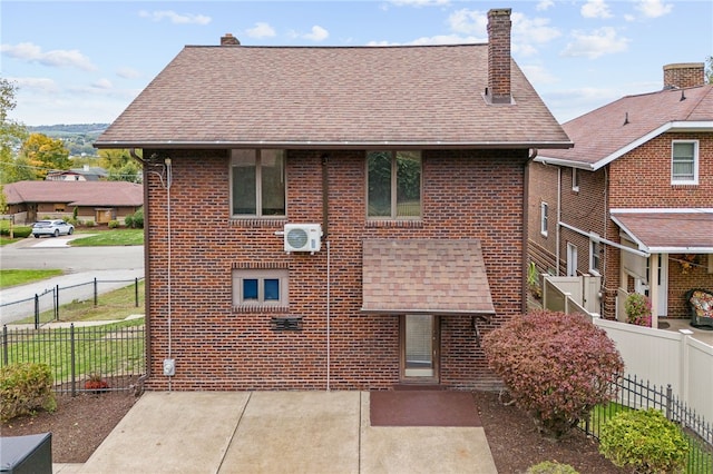 rear view of property with a patio