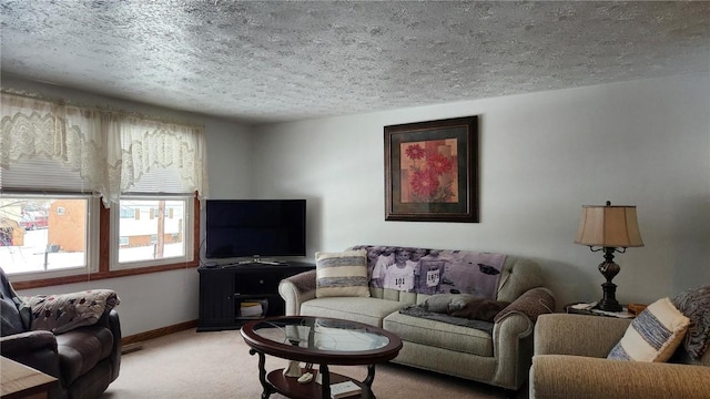 living room with light colored carpet and a textured ceiling