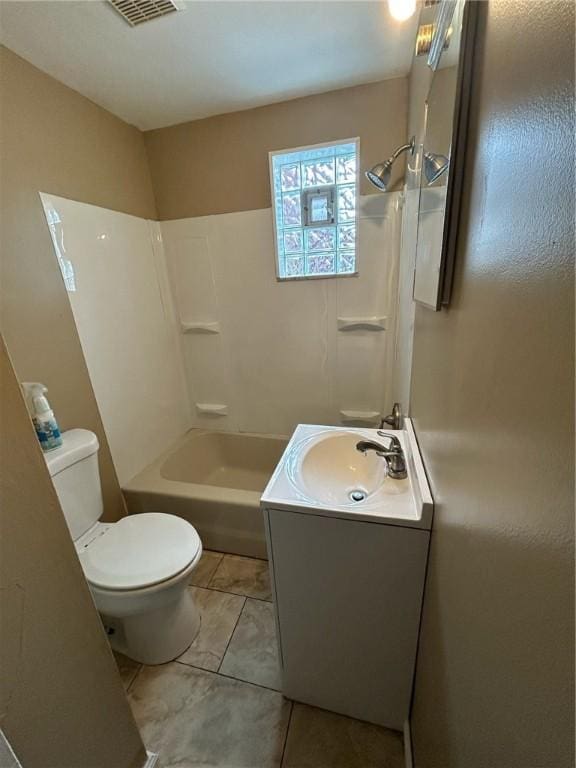 full bathroom with vanity, shower / bath combination, and toilet