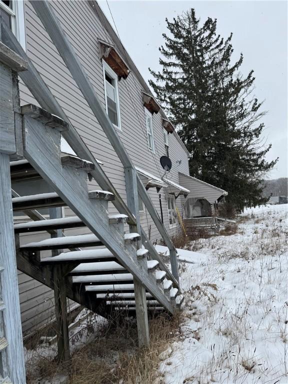 view of snow covered property