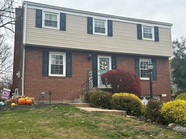 view of front of home with a front yard