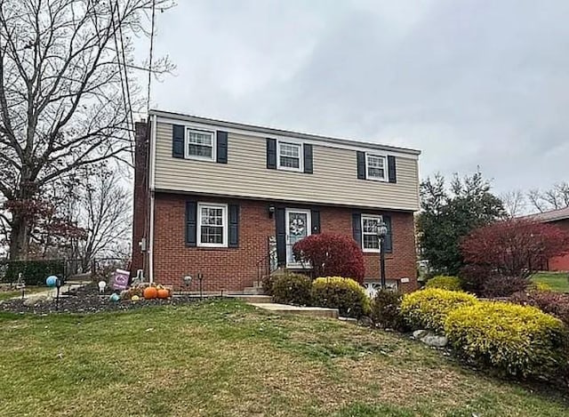 view of property with a front lawn