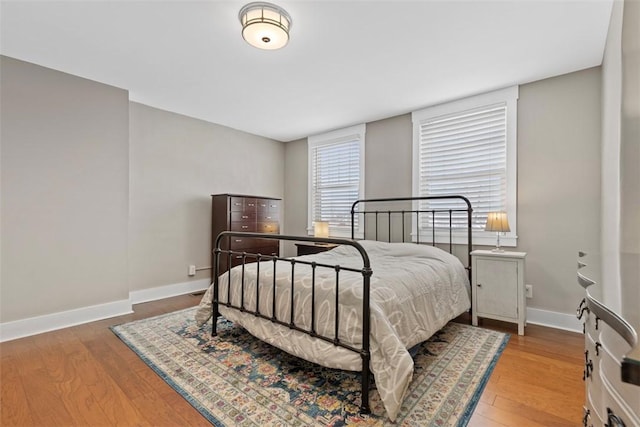 bedroom featuring hardwood / wood-style floors