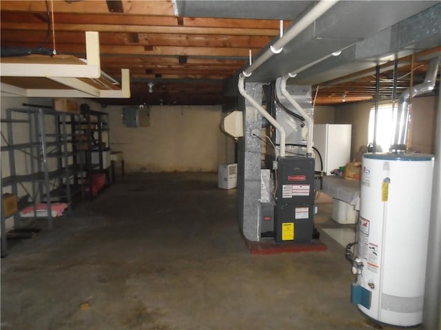 basement featuring heating unit and water heater