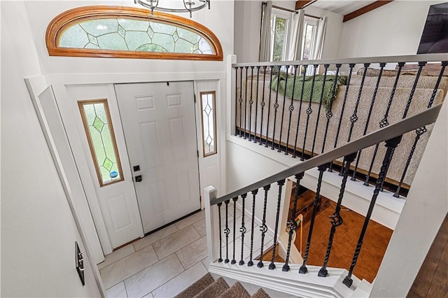 foyer with tile patterned floors